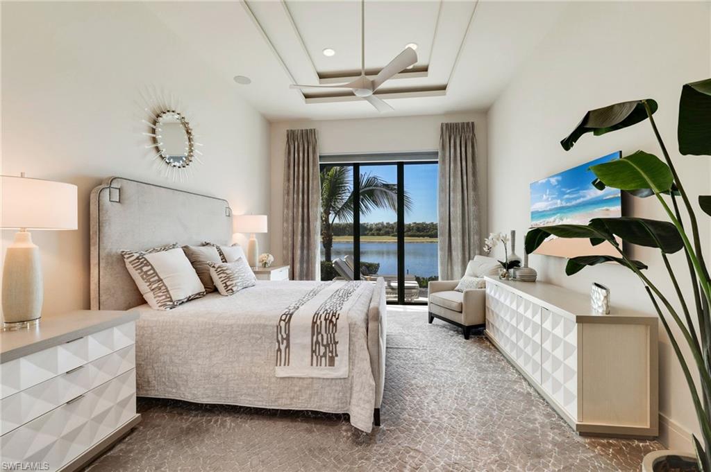 18488 Miromar Lakes Boulevard Miromar Lakes, FL 33913 - Photo 15 of 48 a bed room with a bed and a window