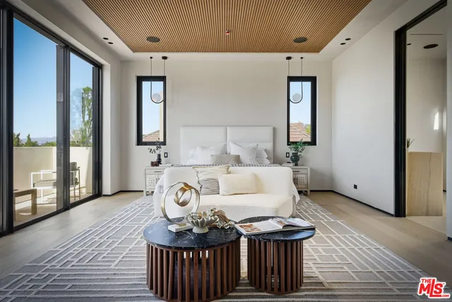 a view of a bathroom with a tub and shower