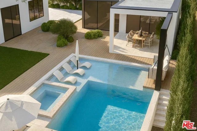 a view of living room with furniture and a potted plant