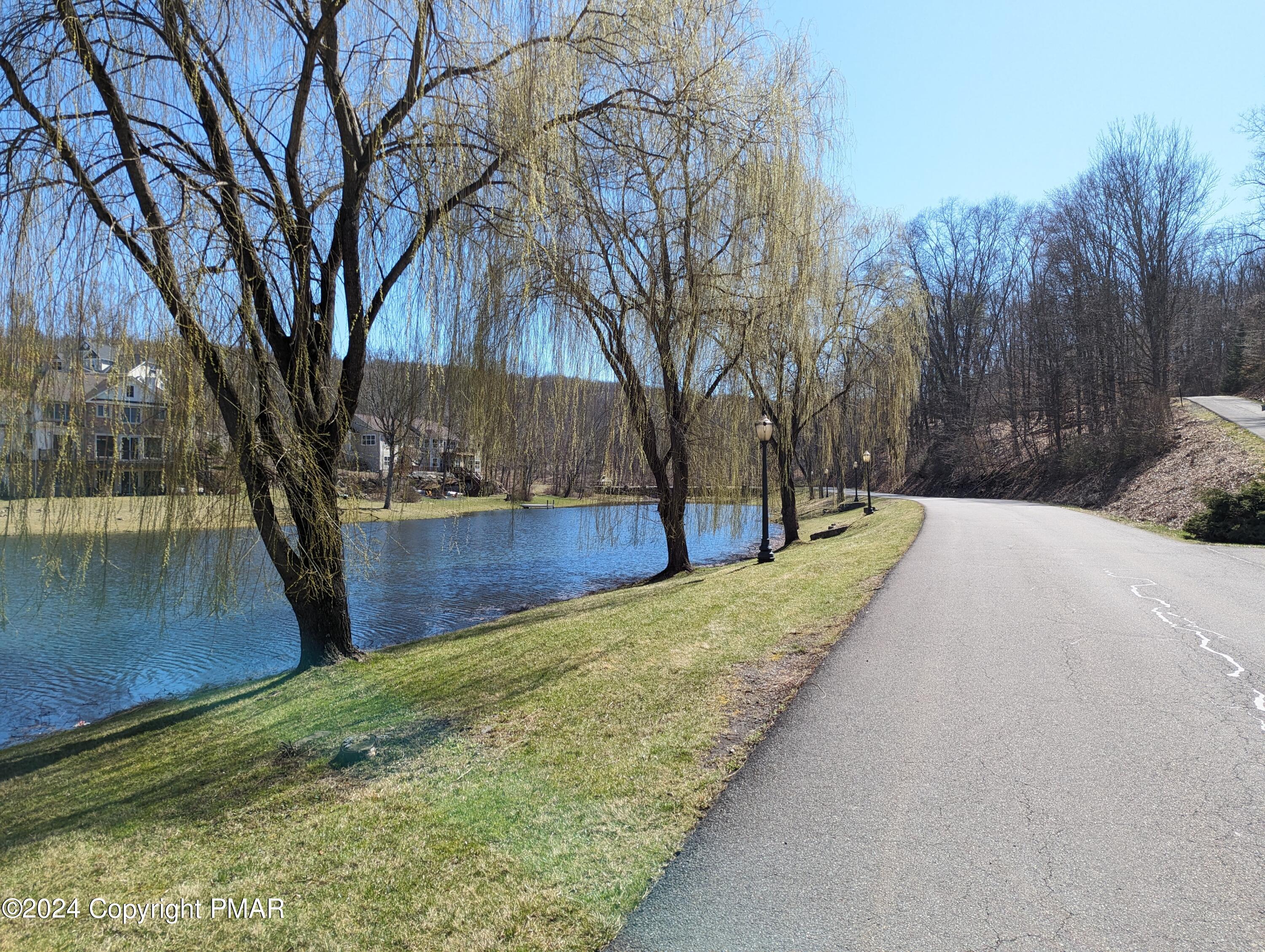 507 McKinley Way East Stroudsburg, PA 18301 - Photo 5 of 9 a view of a backyard with large trees