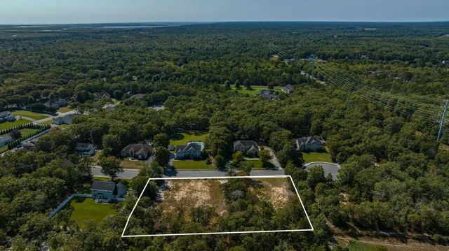 an aerial view of residential house with outdoor space