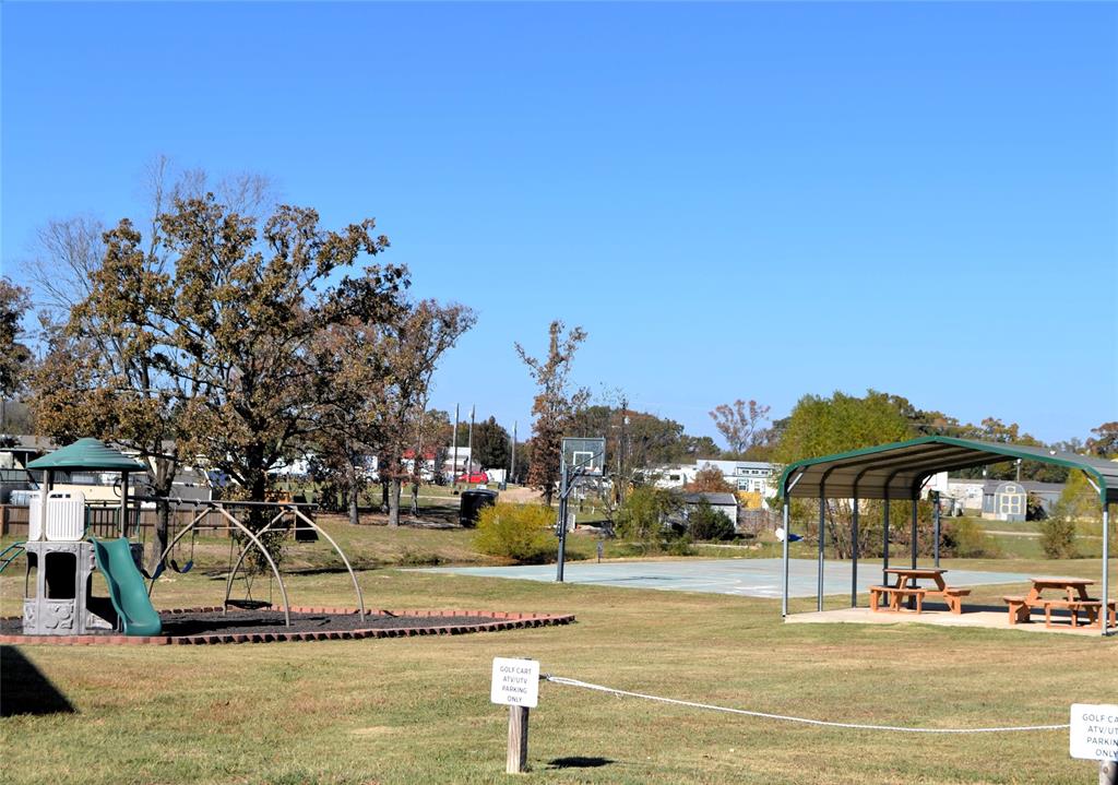 Lot 252-253 Choctaw Quitman, TX 75783 - Photo 16 of 20 a view of a yard with cars