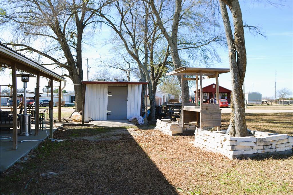 Lot 252-253 Choctaw Quitman, TX 75783 - Photo 9 of 20 a view of a house with backyard porch and sitting area