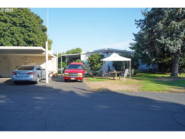 a childrens park with lots of swings and slides