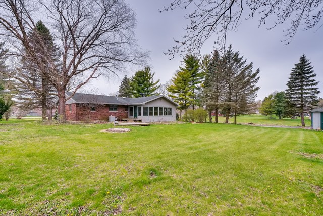 1331 West Maple Road New Lenox, IL 60451 - Photo 17 of 17 a front view of a house with a big yard