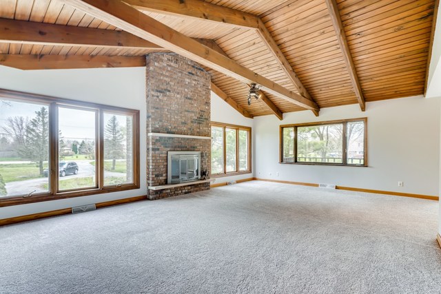 1331 West Maple Road New Lenox, IL 60451 - Photo 4 of 17 an empty room with windows