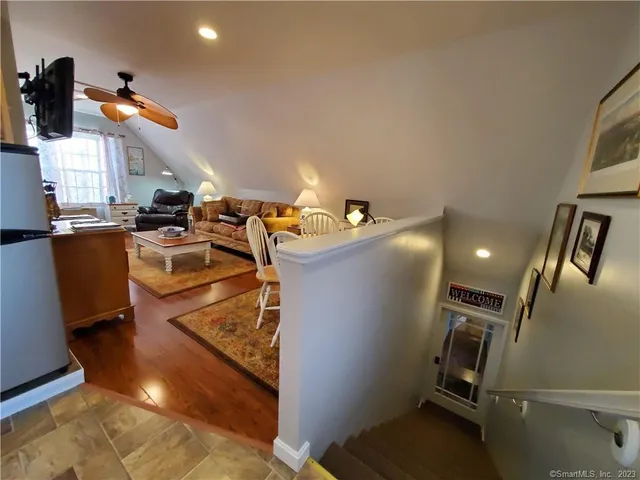 a view of a room with workspace and mirror