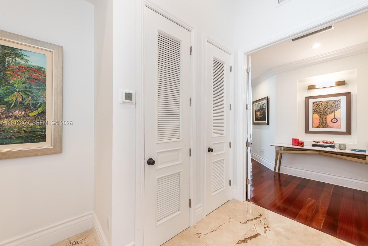 12311 Southwest 94th Avenue Miami, FL 33176 - Photo 17 of 32 a very nice looking room with a wooden floor and cabinets