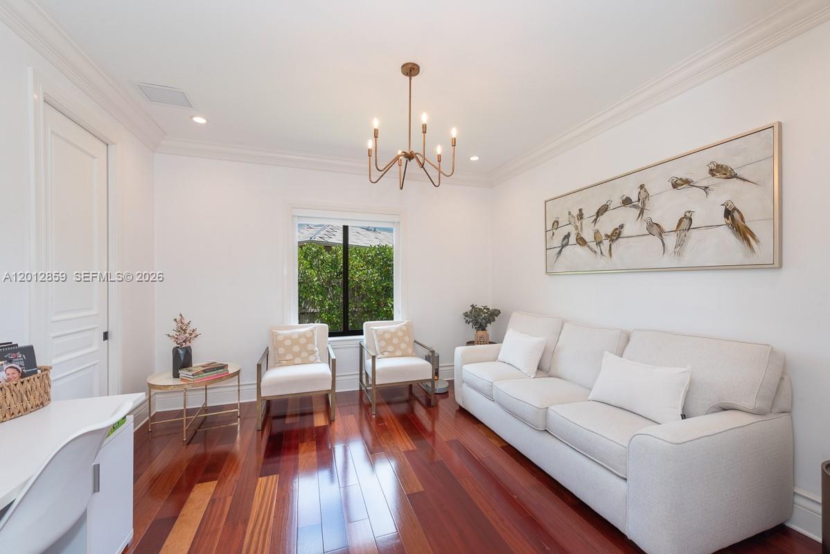 12311 Southwest 94th Avenue Miami, FL 33176 - Photo 18 of 32 a living room with furniture and a wooden floor