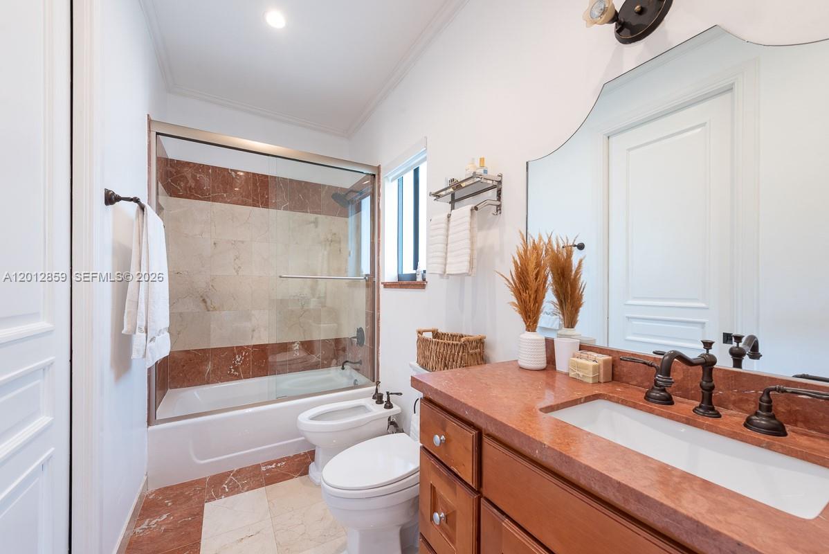 12311 Southwest 94th Avenue Miami, FL 33176 - Photo 20 of 32 a bathroom with a sink a toilet and a bathtub