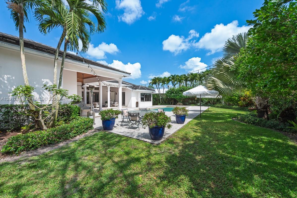 12311 Southwest 94th Avenue Miami, FL 33176 - Photo 30 of 32 a view of a house with backyard and sitting area