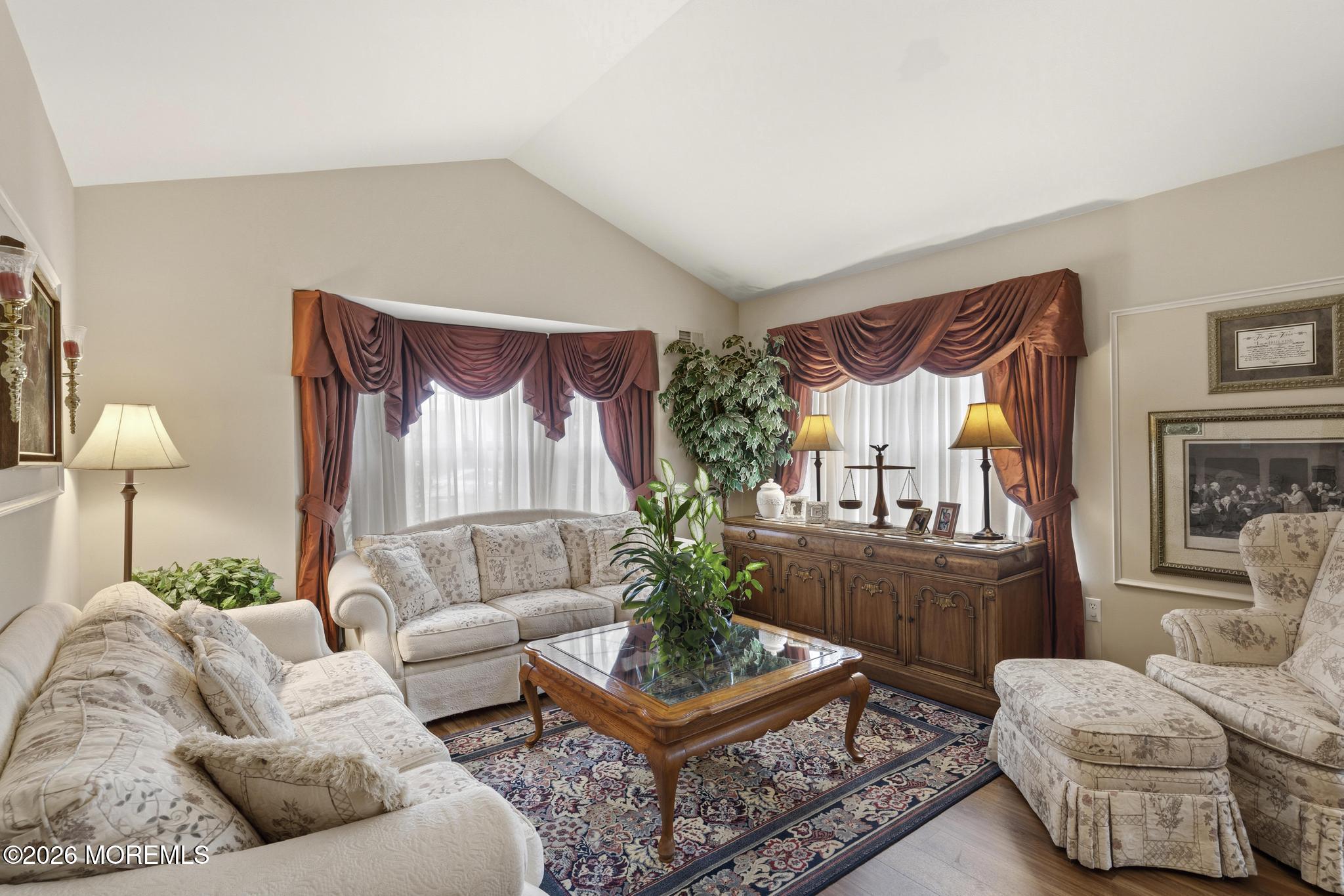 62 Ivy Hill Road Lakewood, NJ 08701 - Photo 12 of 62 a living room with furniture and a potted plant