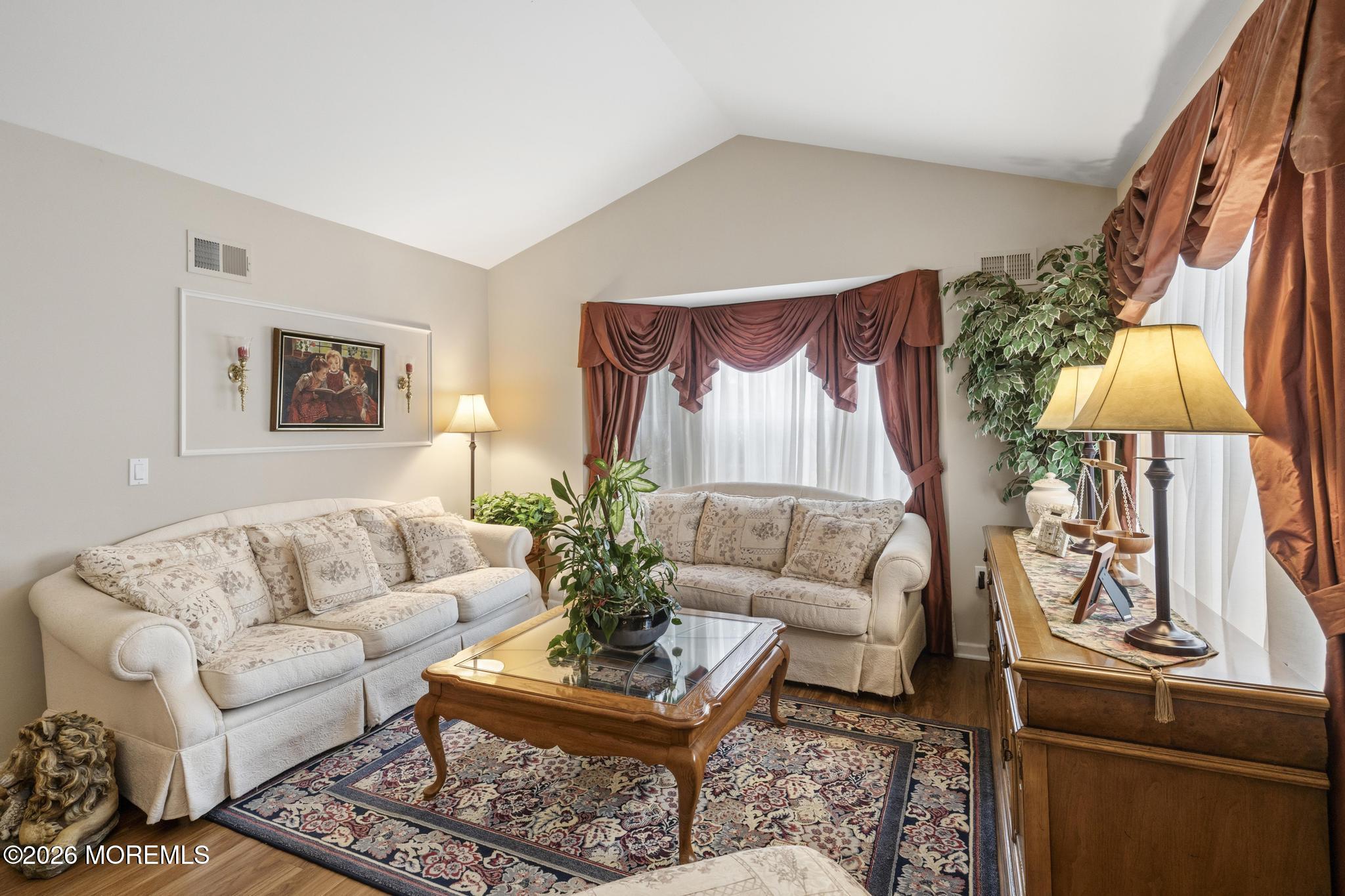62 Ivy Hill Road Lakewood, NJ 08701 - Photo 13 of 62 a living room with furniture and a potted plant