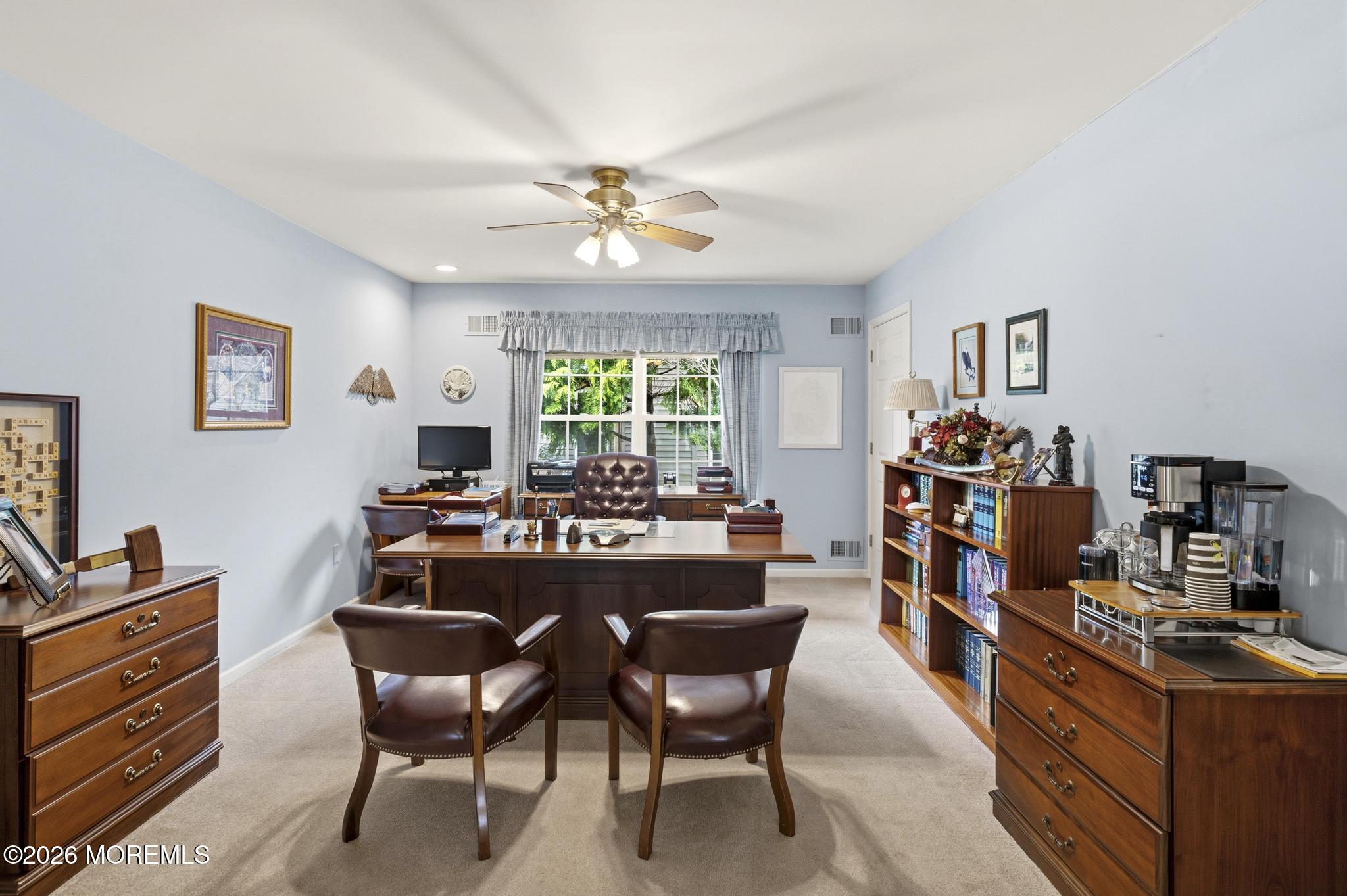 62 Ivy Hill Road Lakewood, NJ 08701 - Photo 15 of 62 a view of a dining room with furniture a rug and wooden floor