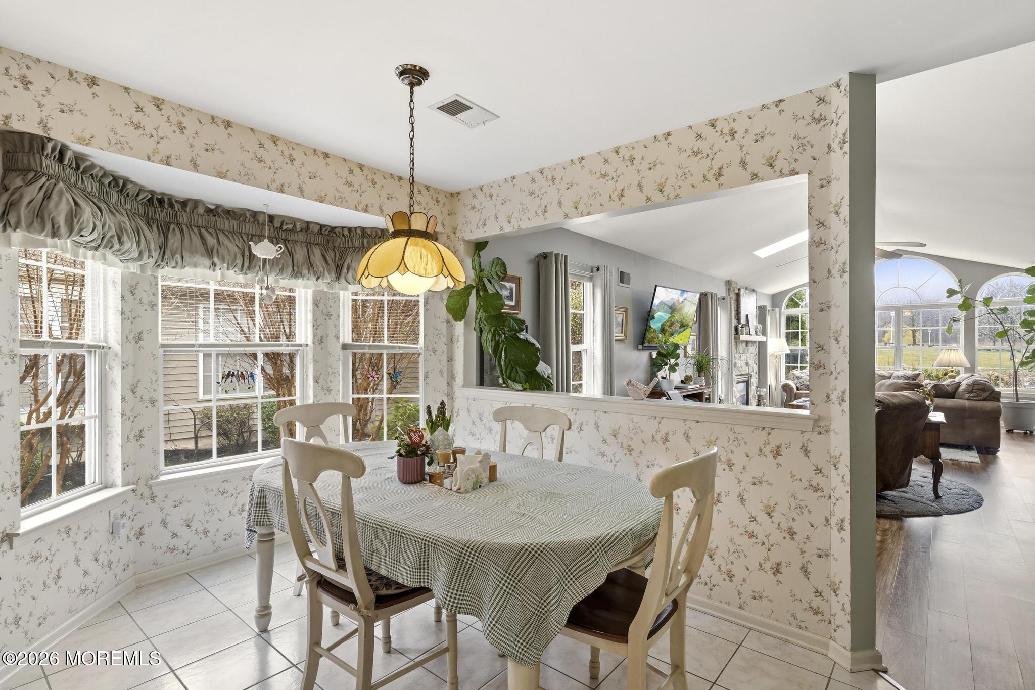 62 Ivy Hill Road Lakewood, NJ 08701 - Photo 24 of 62 a view of a dining room with furniture wooden floor and chandelier