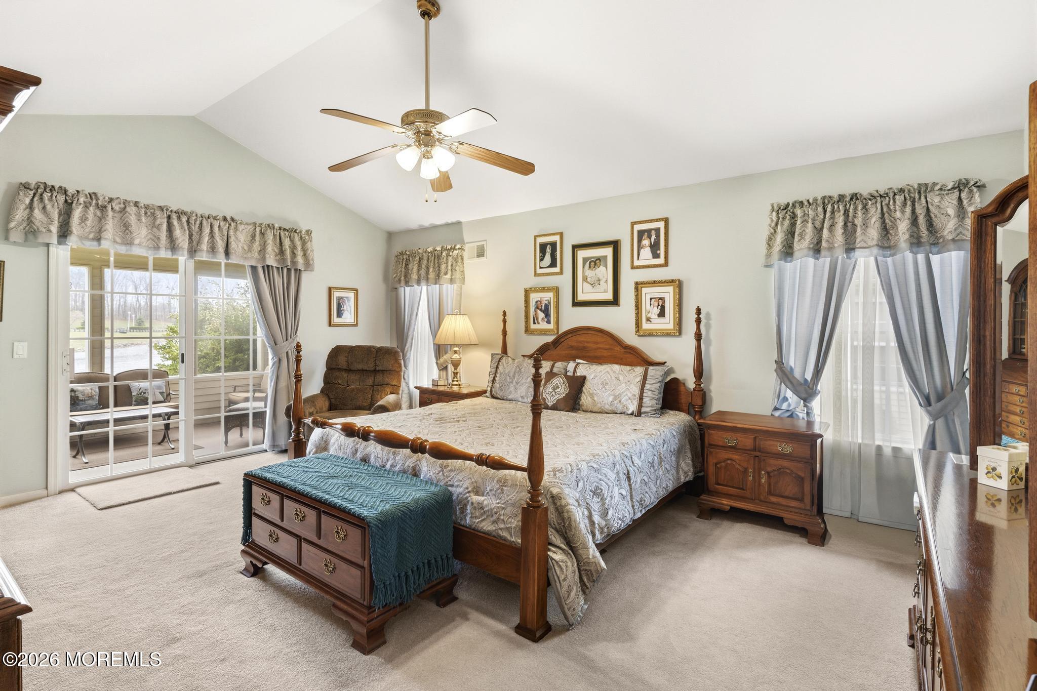 62 Ivy Hill Road Lakewood, NJ 08701 - Photo 35 of 62 a bedroom with a bed and a chandelier