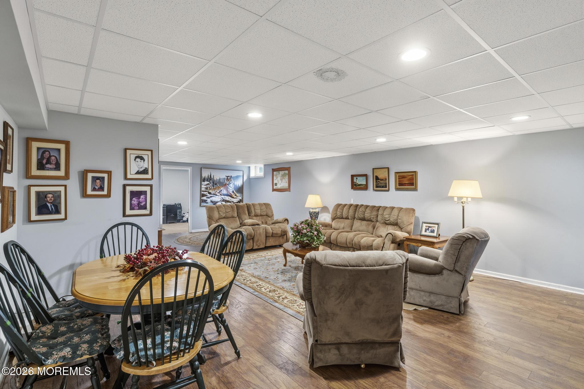 62 Ivy Hill Road Lakewood, NJ 08701 - Photo 48 of 62 a living room with furniture a dining table and kitchen view