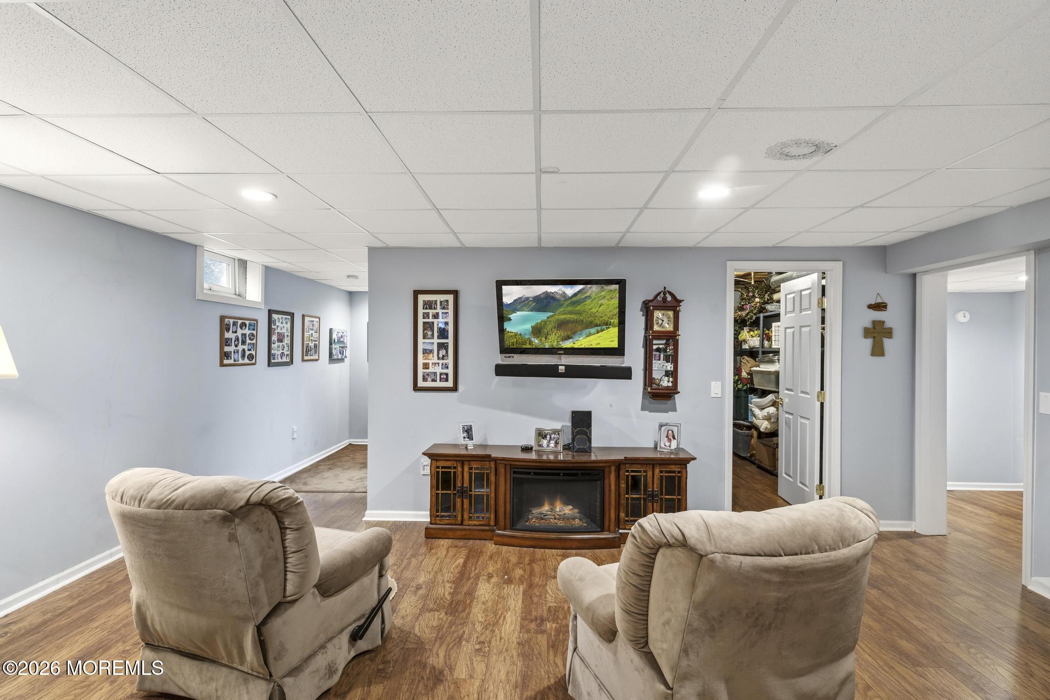 62 Ivy Hill Road Lakewood, NJ 08701 - Photo 49 of 62 a living room with furniture and a flat screen tv