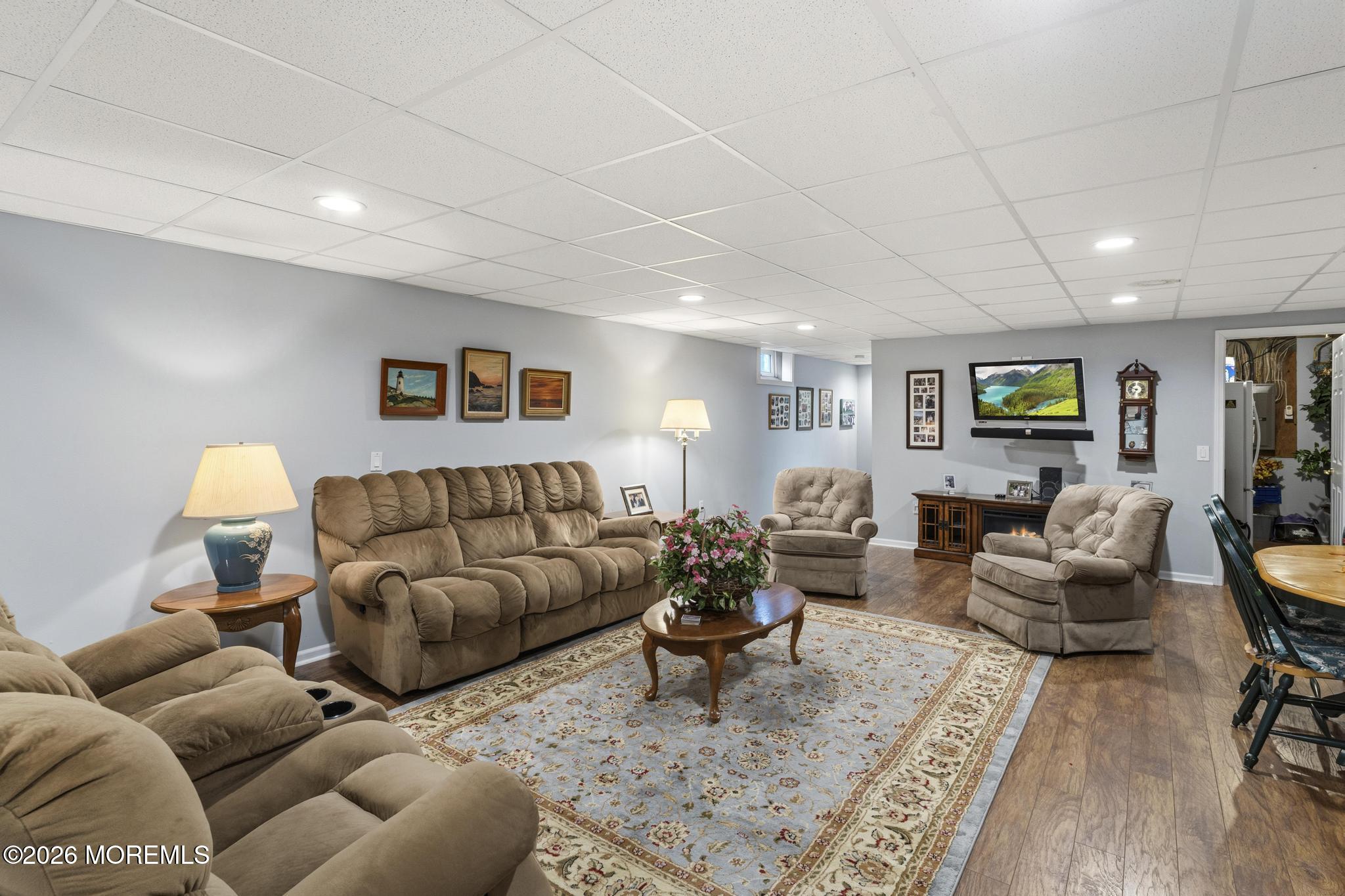 62 Ivy Hill Road Lakewood, NJ 08701 - Photo 50 of 62 a living room with furniture and wooden floor