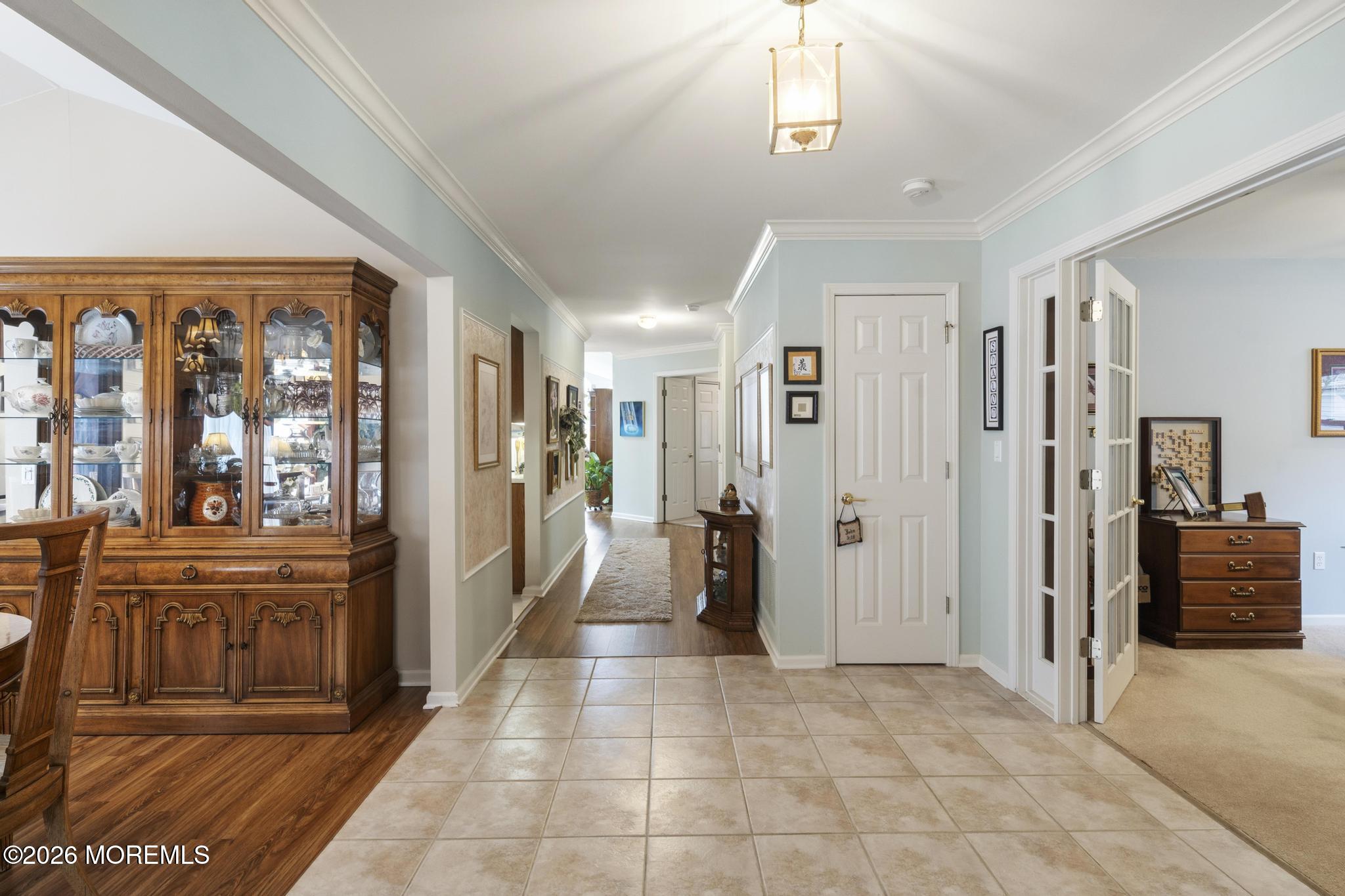 62 Ivy Hill Road Lakewood, NJ 08701 - Photo 5 of 62 a view of a hallway with furniture and windows