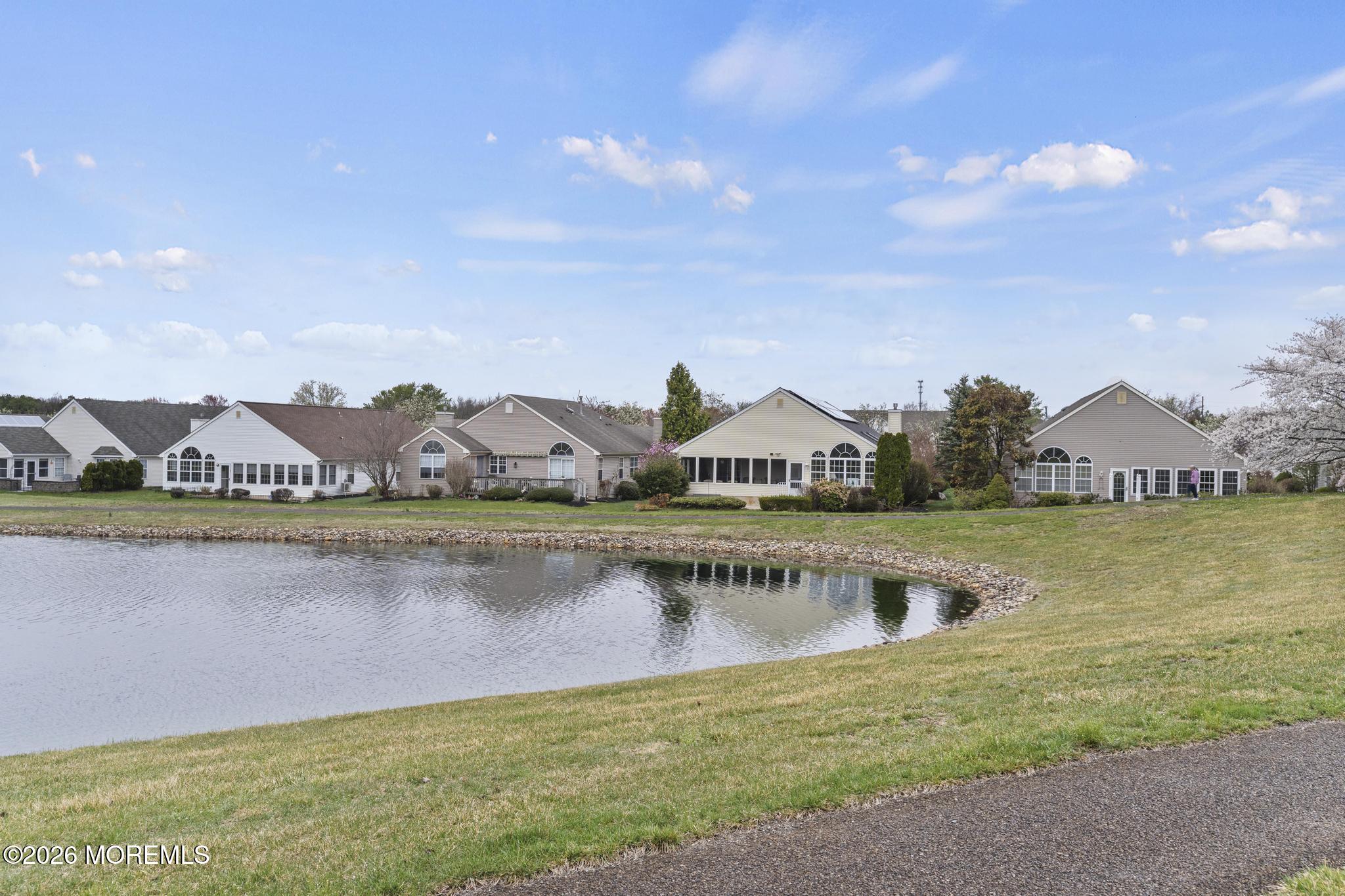 62 Ivy Hill Road Lakewood, NJ 08701 - Photo 54 of 62 a view of a lake with houses in the back