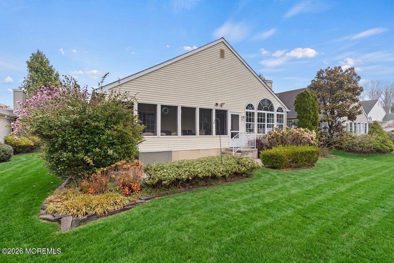 62 Ivy Hill Road Lakewood, NJ 08701 - Photo 59 of 62 a view of a house with backyard and garden