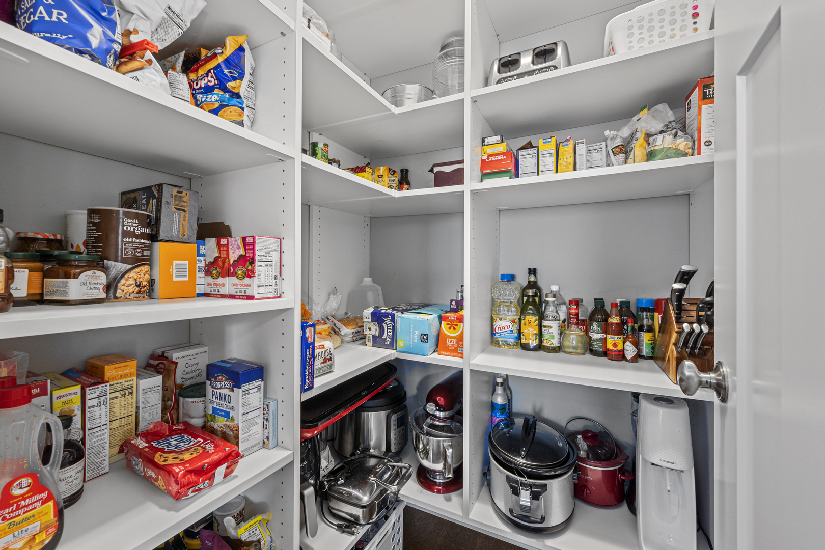 2035 Windham Circle Wheaton, IL 60187 - Photo 23 of 40 a store room with lots of clutter and storage