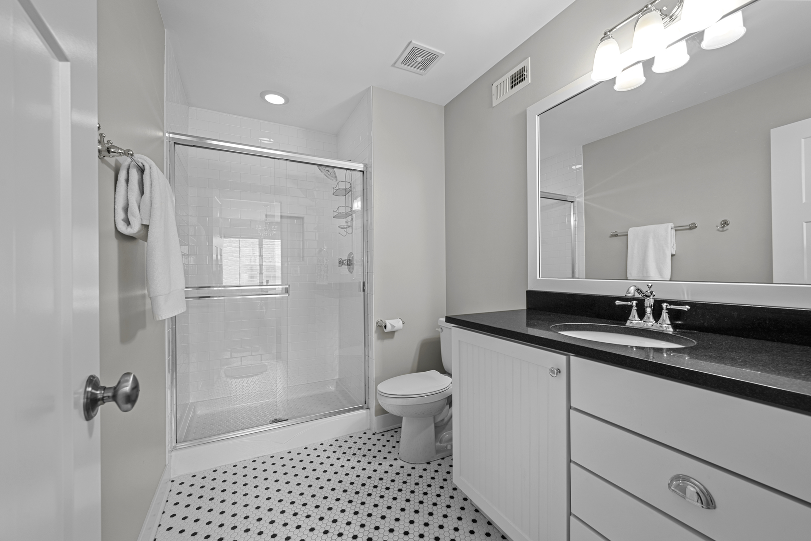 2035 Windham Circle Wheaton, IL 60187 - Photo 27 of 40 a bathroom with a granite countertop sink a toilet a mirror and shower