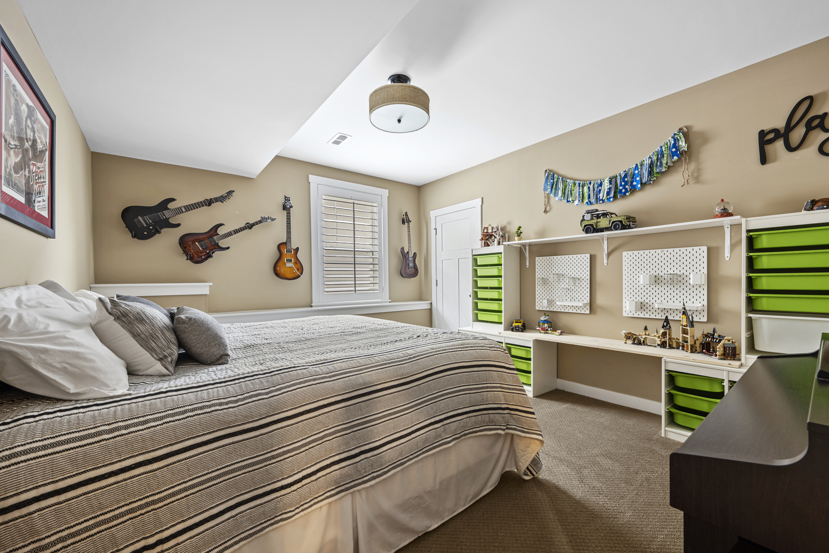 2035 Windham Circle Wheaton, IL 60187 - Photo 29 of 40 a bedroom with a bed and a chandelier