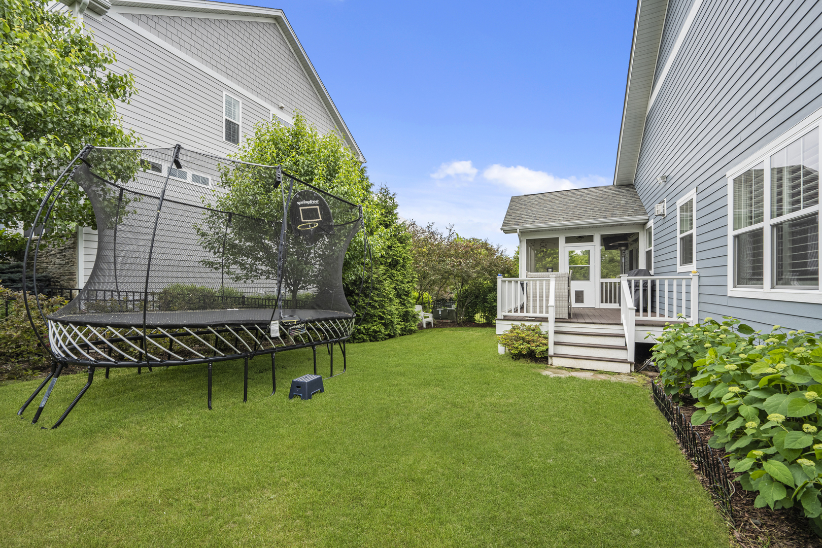 2035 Windham Circle Wheaton, IL 60187 - Photo 35 of 40 a view of a house with backyard sitting area and garden