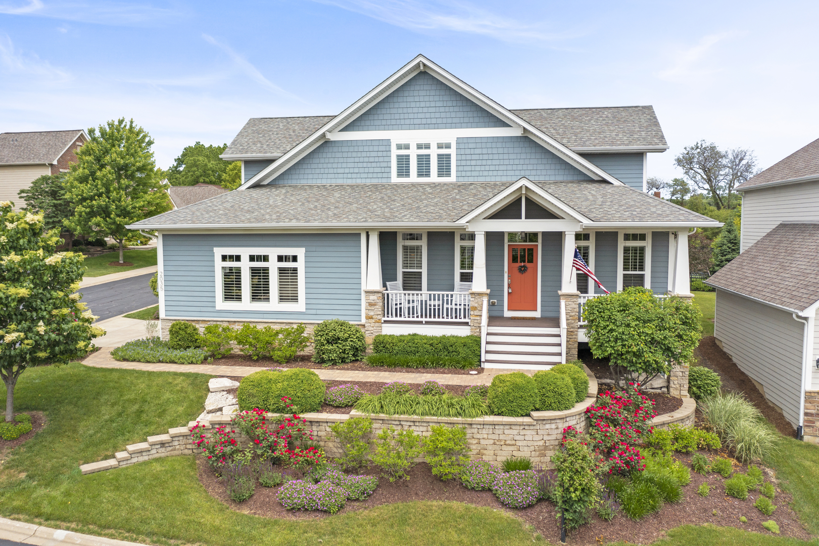 2035 Windham Circle Wheaton, IL 60187 - Photo 37 of 40 a front view of a house with garden