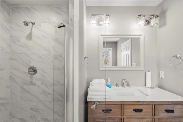 a white bath tub sitting in a bathroom