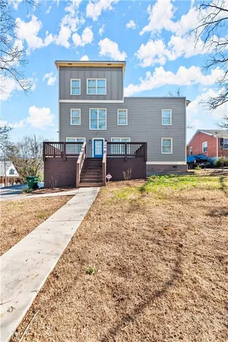 a view of a backyard with a table and chairs and ice snow