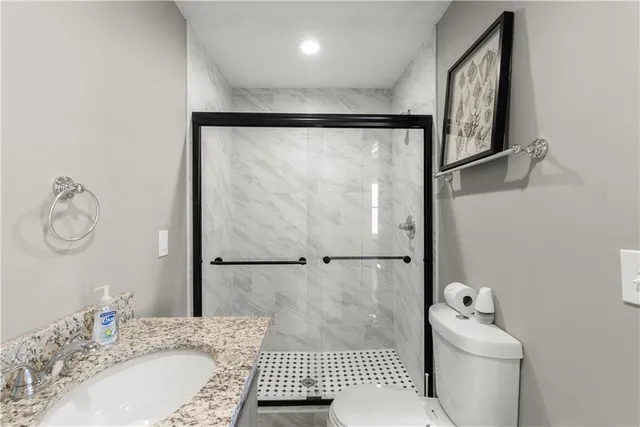 a view of a two chairs on the deck