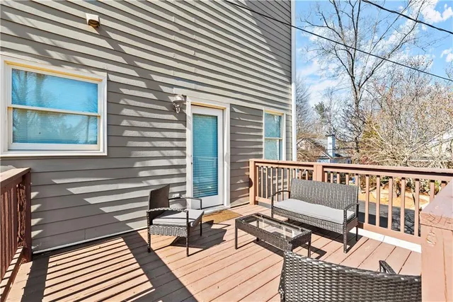 a view of a house with snow on the road