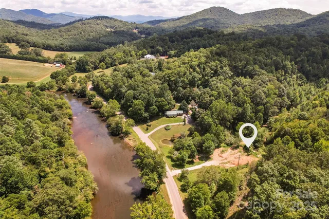 a view of a city with mountains in the background