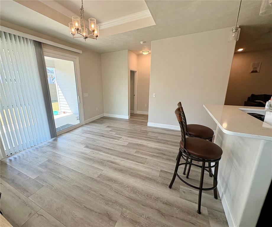 6737 Southwest 13th Lane Gainesville, FL 32607 - Photo 16 of 24 a view of a room with furniture and windows