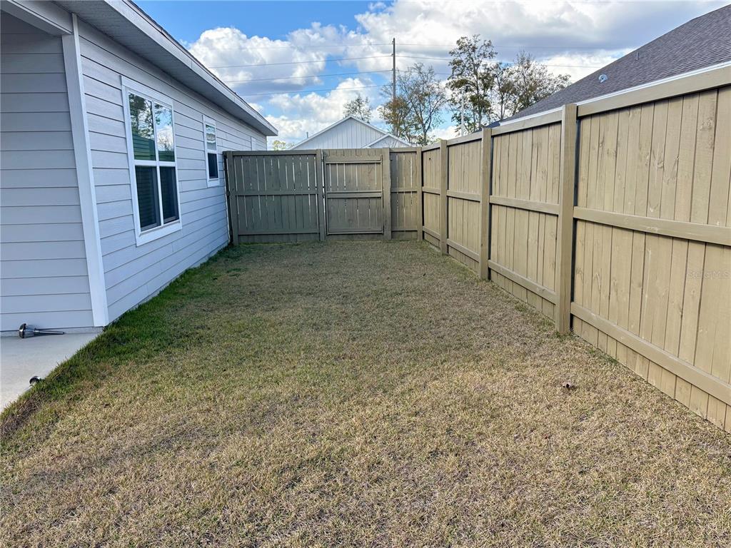 6737 Southwest 13th Lane Gainesville, FL 32607 - Photo 24 of 24 a view of a backyard