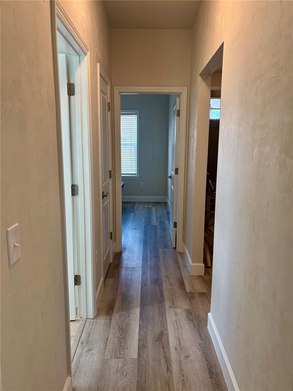 6737 Southwest 13th Lane Gainesville, FL 32607 - Photo 5 of 24 wooden floor in a gallery