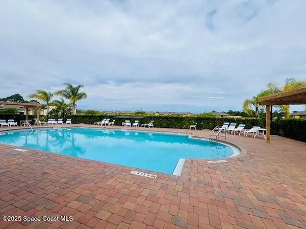 a view of a swimming pool and lake view
