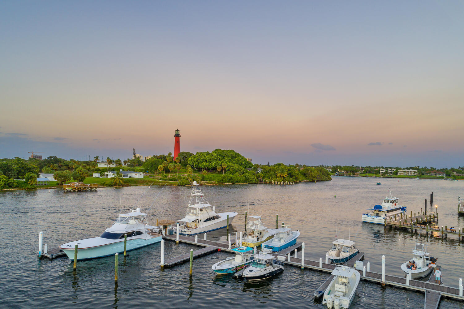 100 Ocean Trail Way, Unit 207 Jupiter, FL 33477 - Photo 54 of 61 a lake view with tables and chairs