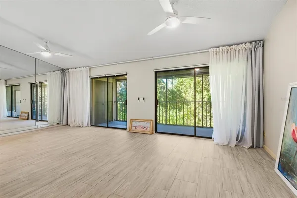 a view of a kitchen cabinets and wooden floor