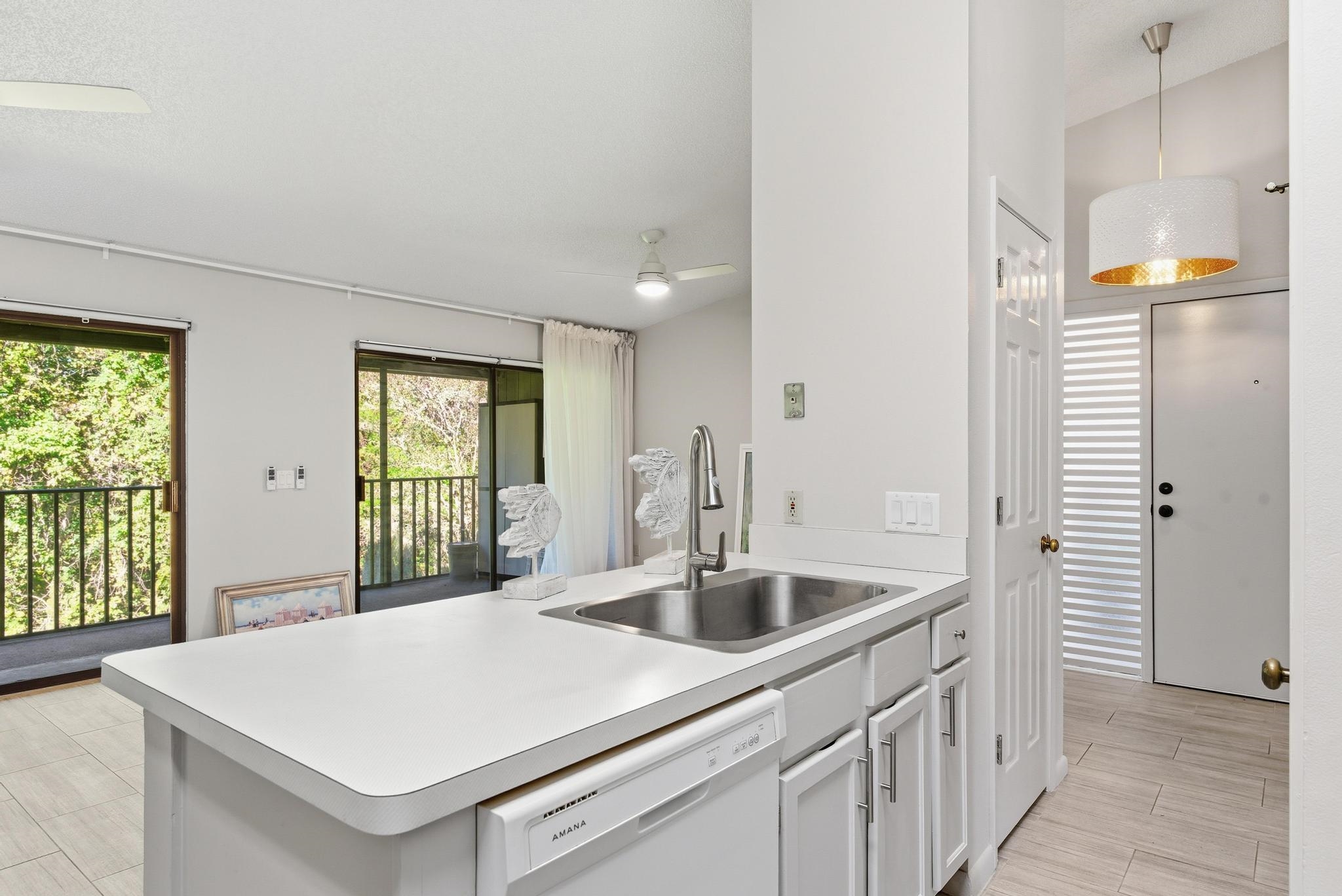 32 Navarra Court St. Augustine Shores, FL 32086 - Photo 15 of 40 a kitchen that has a sink a window and cabinets