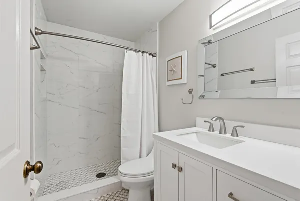 a kitchen with a stove and a sink