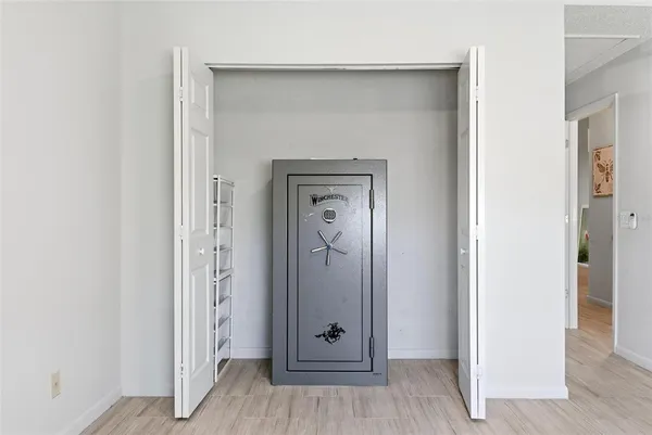 a bathroom with a mirror and a shower