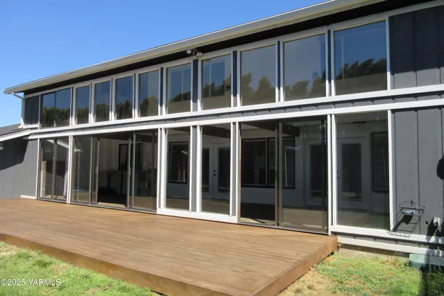 a view of a house with a large window