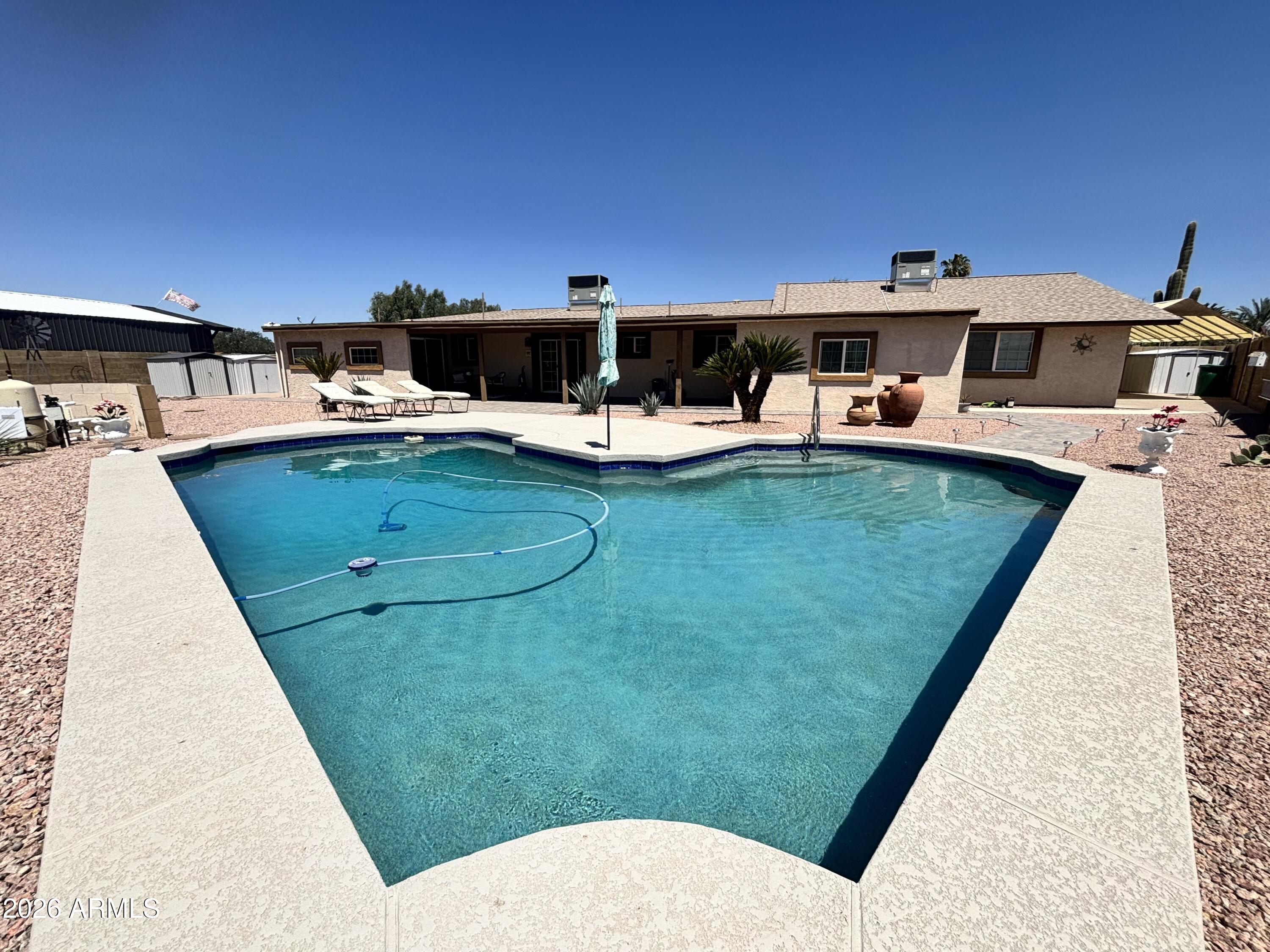 7745 East Mangun Road Mesa, AZ 85207 - Photo 13 of 35 swimming pool view with a seating space