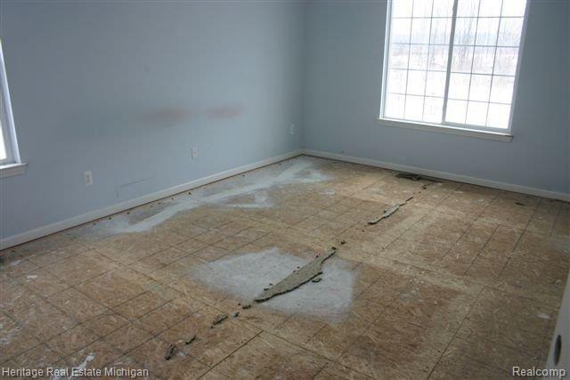 8080 North Gregory Road Fowlerville, MI 48836 - Photo 10 of 22 Master Bedroom