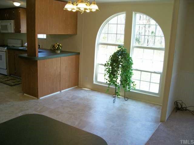 9580 Cornwall Road Oxford, NC 27565 - Photo 7 of 12 Breakfast room with lovely window adjacent to the kitchen.