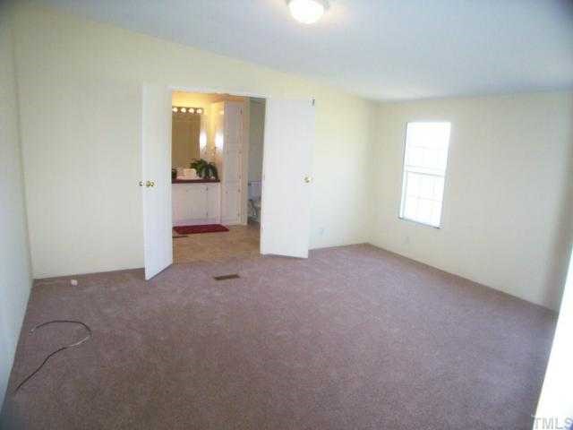 9580 Cornwall Road Oxford, NC 27565 - Photo 8 of 12 Nice size Master bedroom with huge master bath.
